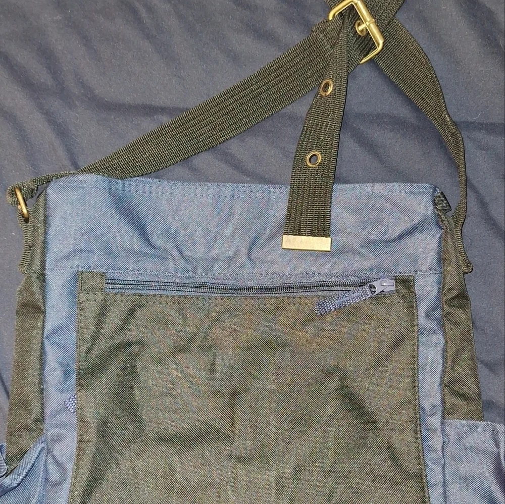 Stylish Blue and Black Men's Bag with Adjustable Strap and Side Bottle Holder